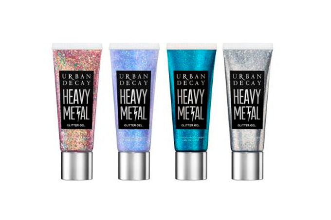 A imagem mostra 4 embalagens do glitter Heavy Metal, nas cores rosa, azul claro, azul escuro e prata.