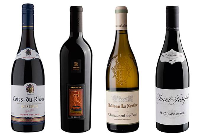Vinhos do Rhône: a imagem mostra 4 garrafas de vinho alinhadas num fundo branco.